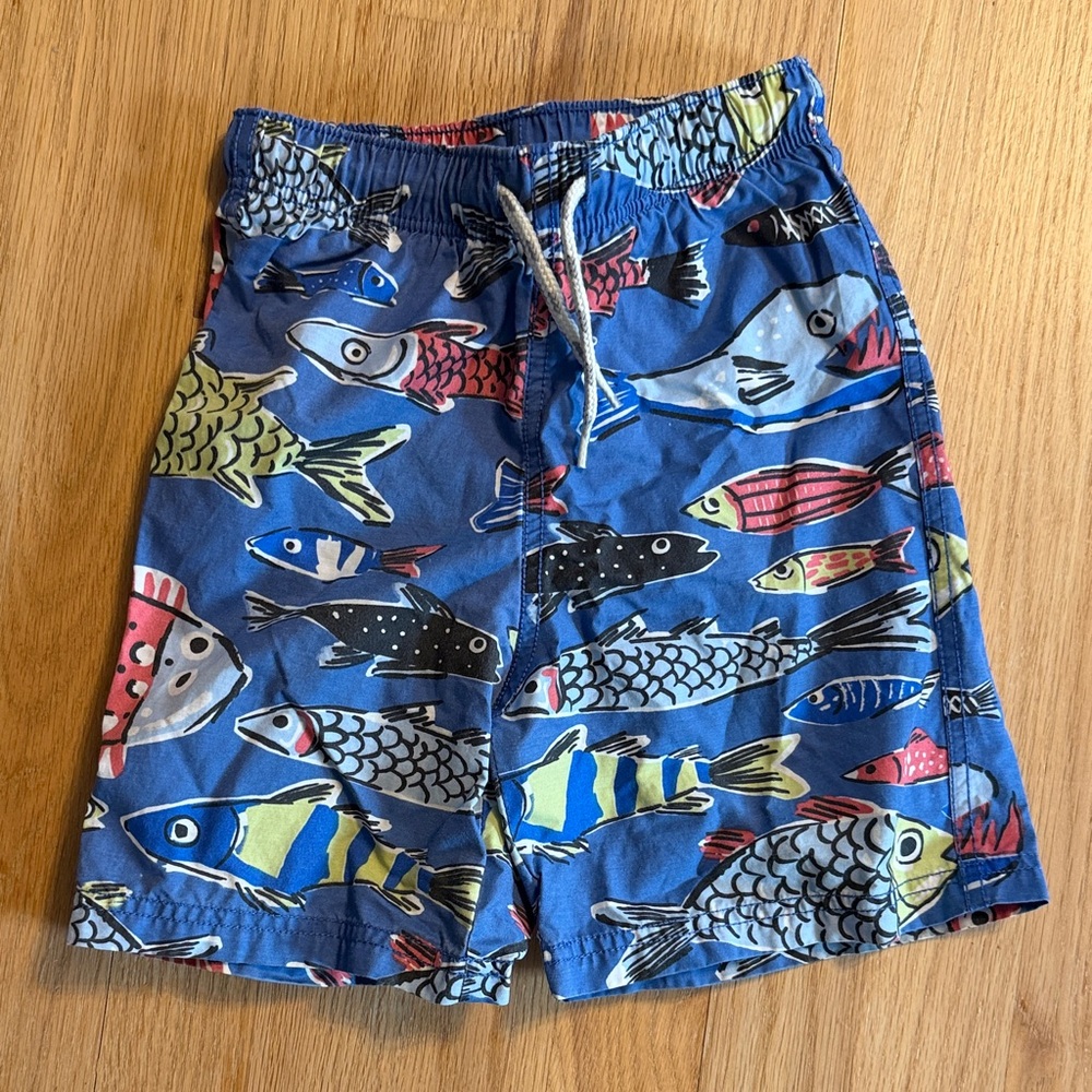 Boys Boden Blue Swim Trunks with Vibrant Fish Design, Size 3/4